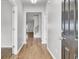 Inviting home foyer featuring hardwood floors and an open view to the living area and staircase at 121 Ancestry Ln, Moncks Corner, SC 29461