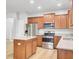 Kitchen with stainless steel appliances, granite counters, and an island at 121 Ancestry Ln, Moncks Corner, SC 29461