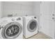 Convenient laundry area with modern Samsung washer and dryer for efficient chores at 121 Ancestry Ln, Moncks Corner, SC 29461