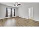Bright main bedroom features natural light, ceiling fan and wood-look floors at 121 Ancestry Ln, Moncks Corner, SC 29461