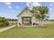 Charming lakeside pavilion with picnic tables and grills, perfect for outdoor gatherings and relaxation at 121 Ancestry Ln, Moncks Corner, SC 29461