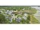 Desirable community featuring beautiful homes, lush greenery, and tranquil waterways, perfect for upscale coastal living at 1216 Rivers Reach Dr, Charleston, SC 29492