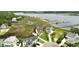 Picturesque waterfront property featuring charming homes, scenic marsh views, and private docks for serene coastal living at 1216 Rivers Reach Dr, Charleston, SC 29492