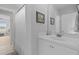 Bathroom featuring a mirror, cabinets, and shower with tile flooring and white curtain at 1216 Rivers Reach Dr, Charleston, SC 29492