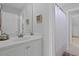 Bathroom featuring a mirror, cabinets, and shower with white curtain and tile flooring at 1216 Rivers Reach Dr, Charleston, SC 29492