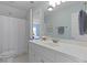 Well-lit bathroom featuring a white vanity with a large mirror, toilet and shower at 1216 Rivers Reach Dr, Charleston, SC 29492