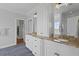 Elegant bathroom featuring dual sinks, granite countertops, and custom cabinetry, offering both style and functionality at 1216 Rivers Reach Dr, Charleston, SC 29492