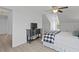 Light bedroom featuring plank floors, white walls, and dark wood storage at 1216 Rivers Reach Dr, Charleston, SC 29492