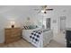 Spacious bedroom with white walls, plank floors, a walk-in closet and ensuite bath at 1216 Rivers Reach Dr, Charleston, SC 29492