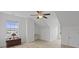 Bright bedroom featuring a ceiling fan, a window with a view, and light wood flooring at 1216 Rivers Reach Dr, Charleston, SC 29492