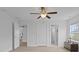 Bright bedroom featuring doorways to a bathroom and other rooms, with light wood flooring at 1216 Rivers Reach Dr, Charleston, SC 29492