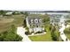Elegant two-story home with a welcoming porch, lush landscaping, and serene marsh views for relaxed coastal living at 1216 Rivers Reach Dr, Charleston, SC 29492