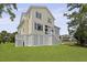 Charming two-story home showcasing a well-maintained lawn and inviting exterior features at 1216 Rivers Reach Dr, Charleston, SC 29492