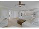 Open-concept living area with a modern kitchen, light wood floors, and large windows offering ample natural light at 1216 Rivers Reach Dr, Charleston, SC 29492