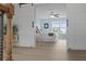 Main bedroom view featuring light blue walls, decorative barn doors, and a ceiling fan at 1216 Rivers Reach Dr, Charleston, SC 29492