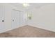 Bedroom with neutral carpet, fan, and large closet at 1240 Fairmont Ave # 22, Mount Pleasant, SC 29464