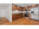 Open kitchen with stainless steel appliances, wood cabinets, and granite countertops at 1240 Fairmont Ave # 22, Mount Pleasant, SC 29464