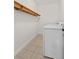 Functional laundry room with white washing machine and tile flooring at 1240 Fairmont Ave # 22, Mount Pleasant, SC 29464