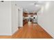 Spacious living room featuring hardwood floors, crown molding, and stainless steel appliances at 1240 Fairmont Ave # 22, Mount Pleasant, SC 29464