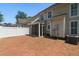 Spacious backyard featuring a large paved patio and screened-in porch at 125 Greyson Cir, Goose Creek, SC 29445