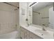Spacious bathroom features double sinks, full-sized mirror, and shower-tub combo at 125 Greyson Cir, Goose Creek, SC 29445