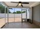 Screened porch with tiled floors and a view of the fenced backyard at 125 Greyson Cir, Goose Creek, SC 29445