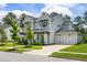 Stunning two-story home with attached two-car garage, well-maintained landscaping, and inviting curb appeal at 125 Integrity Ln, Charleston, SC 29492
