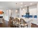 Open kitchen features an island with seating and stainless appliances, blending with dining and living spaces at 125 Integrity Ln, Charleston, SC 29492