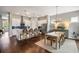 Spacious kitchen with white cabinets, stainless steel appliances, a large island, and adjacent dining area at 125 Integrity Ln, Charleston, SC 29492