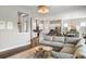 Open-concept living room with a view of the kitchen and dining area at 125 Integrity Ln, Charleston, SC 29492
