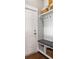 Functional mudroom with built-in bench, storage, and hooks near the entry door at 125 Integrity Ln, Charleston, SC 29492