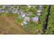 Aerial view of the neighborhood, showcasing marsh views and private pools at 1308 Divot Ct, Mount Pleasant, SC 29466