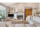 Inviting living room boasts a fireplace with detailed mantel, custom built-ins, and comfortable seating for relaxing at 1308 Divot Ct, Mount Pleasant, SC 29466
