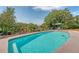 Enjoy a beautiful day in this backyard swimming pool surrounded by lush landscaping at 1308 Divot Ct, Mount Pleasant, SC 29466
