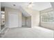 Large bedroom with attic ceiling and neutral carpet, two closets, and window at 1458 Clarendon Way, Mount Pleasant, SC 29466