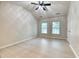 Bright bedroom features two large windows, white walls, and hardwood floors, with a ceiling fan at 149 Woodward Rd, Goose Creek, SC 29445