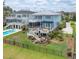 Beautiful backyard with a fenced-in yard, a multi-level deck, a pergola, and lush landscaping at 1597 Rivertowne Country Club Dr, Mount Pleasant, SC 29466