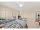 Cozy bedroom with plush carpet, ceiling fan, closet space, and two beds at 1597 Rivertowne Country Club Dr, Mount Pleasant, SC 29466