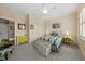 A bright bedroom with a charming decor offers comfort and relaxation with a cozy and inviting ambiance at 1597 Rivertowne Country Club Dr, Mount Pleasant, SC 29466