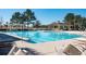 Resort-style pool area offers ample seating, a shaded gazebo, and a refreshing escape for residents at 1597 Rivertowne Country Club Dr, Mount Pleasant, SC 29466