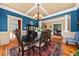 Elegant dining area featuring hardwood floors, neutral walls, and views into other rooms at 1597 Rivertowne Country Club Dr, Mount Pleasant, SC 29466