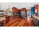 Modern kitchen with granite countertops, stainless steel appliances, and hardwood floors at 1597 Rivertowne Country Club Dr, Mount Pleasant, SC 29466