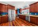 Spacious kitchen featuring stainless appliances, custom cabinetry, and granite counters at 1597 Rivertowne Country Club Dr, Mount Pleasant, SC 29466