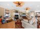 Inviting living room with a fireplace, comfortable seating, and stylish decor at 1597 Rivertowne Country Club Dr, Mount Pleasant, SC 29466