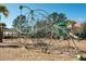Unique playground features a climbing structure, nestled among mature trees and providing a safe play area at 1597 Rivertowne Country Club Dr, Mount Pleasant, SC 29466