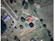 An aerial view of a house on a verdant lot with multiple outbuildings at 160 Syrr Run Rd, Saint George, SC 29477
