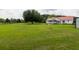 Expansive backyard view with patio furniture, perfect for outdoor entertaining at 160 Syrr Run Rd, Saint George, SC 29477