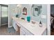 Bathroom with a pebble floor, double vanity, and lots of countertop space at 160 Syrr Run Rd, Saint George, SC 29477
