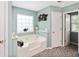 Bathroom with natural light and a bathtub provides a relaxing and pleasant experience at 160 Syrr Run Rd, Saint George, SC 29477