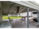 Open carport providing covered parking with a view of the surrounding property at 160 Syrr Run Rd, Saint George, SC 29477